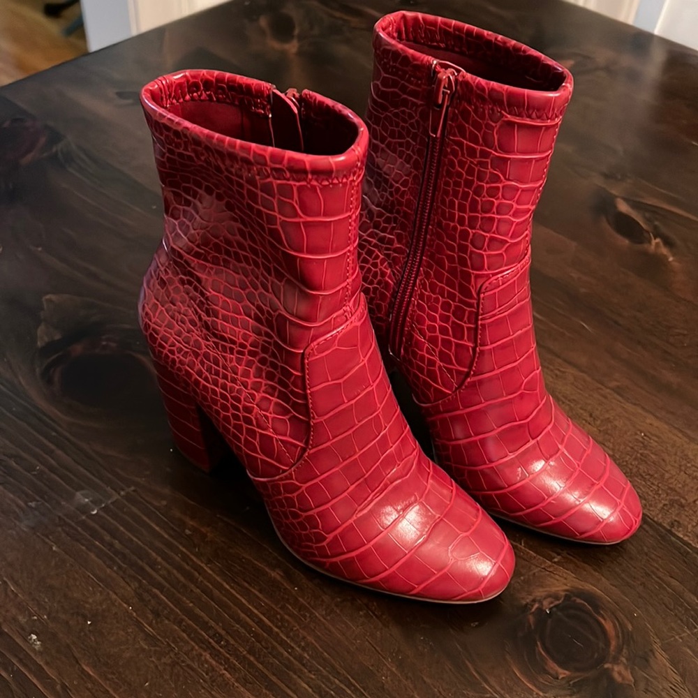 ALDO snakeskin boots.